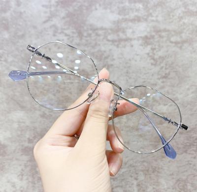 China 15 Years Experience New Trend Blue Light Flat Unisex Fashion Anti Mirror Round Metal Frame Retro Reading Glasses for sale