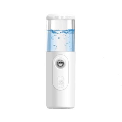 China Mini USB Portable Handheld Electric Personal Care 30ml Deep Clean Facial Massager Nano Moisturizer Face Mist Sprayer for sale