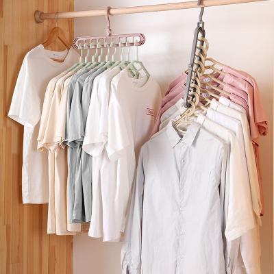 China Plastic Modern Multi-port Clothing Rack Space Saving Hanger Organizer Cabinet Scarf Cabide Storage Hangers For Clothes for sale