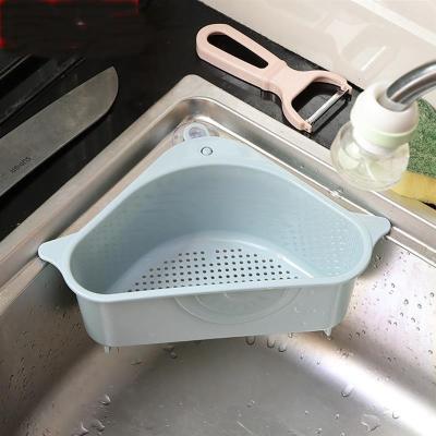 China Viable Triangular Sink Strainer Drain Fruit Vegetable Drainer Basket Suction Cup Sponge Shelf Storage Kitchen Tools Go Down Filter Shelf for sale