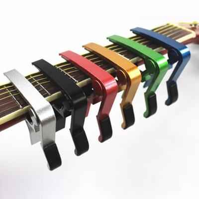 China Guitar lover hand-cut pure aluminum capo, folk guitar capo, ukulele tuner L0506 for sale