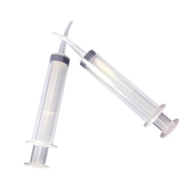 China Plastic Dental Syringe 12cc Disposable Curved Syringe Irrigation Syringe With Curved Tip for sale