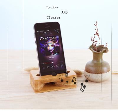 China Carbonized bamboo phone stand with a Physical loudspeaker for iphoneX 8plus for samsung note8 S8 for sale