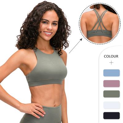 China 2021Spring New QUICK DRY pull round neck top sports underwear women cross beauty back and lift up running yoga workout bra for sale