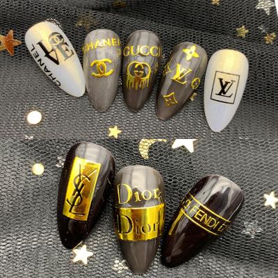 China Nail cosmetics nail decals famous brand logo 3d bronzing nail stickers for sale