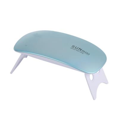 China Mini Handheld Folding Phototherapy Machine Plastic Colorful Lamp Nail Mouse Lamp UV Treatment Dryer for sale