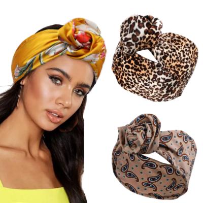 China New Solid Color Printed Yarn Velvet Sporty Flower Knotted Elastic Headband For Ladies Headband for sale