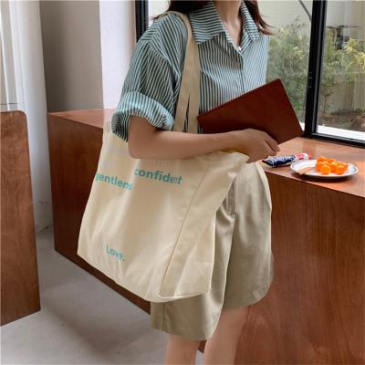 China Durable Custom Girls Tote Bag Cotton Canvas Logo Shopping Grocery Messenger Cheap Luxury Eco Friendly Bags For Women for sale