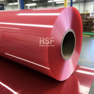 China Película MOPP de polipropileno mono orientado de color rojo translúcido de 1300 mm para etiquetas de cinta en venta