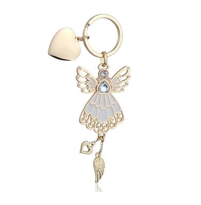 China New Design Keyring Lady's Crystal Angel Wings And Cream Enamel Heart Pendant Icon Valentine Keyring for sale