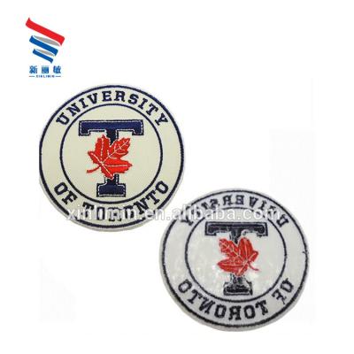 China Customized Logo Golf Embroidered Woven Patches at Direct with Canvas Fabric for sale