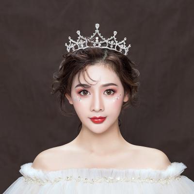 China New Trendy Simple Gold Alloy Diamond Bridal Wedding Tiara Rhinestone Crown Beautiful Crown for sale