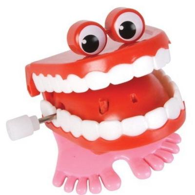 China Plastic Teeth Toy Wind Up Toys Gifts Pinata Loot Bag Walking Jumping Gag for sale