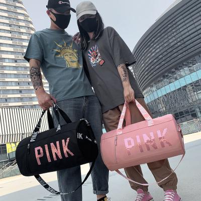 China Cheap High Quality Pink Sports Gym Bag Large Capacity Polyester Sequins Letters Custom Price Logo Gym Bag With Shoe Compartment for sale