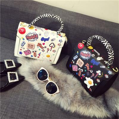 China Custom handbag luxury fashionable lady's badge cartoon print designer graffiti shoulder bag for sale