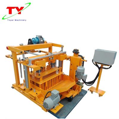 China Building Material Stores QT40-3A Single Manual Operated Movable Hollow Block Making Machine With Small Investment for sale