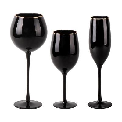 China Lead free and long stem Black Stemed Sparkling Wine Glasses with Gold Rim Black Wine Glasses with Gold Rim for sale