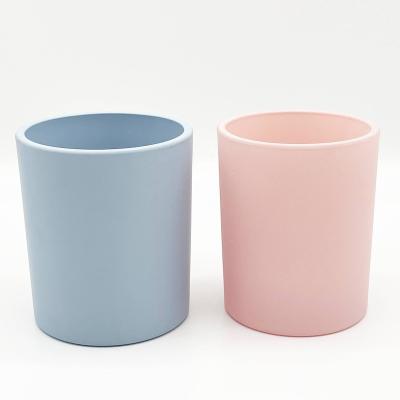 China Wholesale Home Decor Matte Pink Blue Glass Candle Custom Glass Jars With Inside And Outside Color Spray for sale