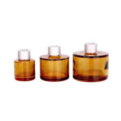 China Cosmetic Round Shape 50ml 130ml 200ml Brown Empty Perfume Reed Diffuser Glass Bottle With Caps for sale