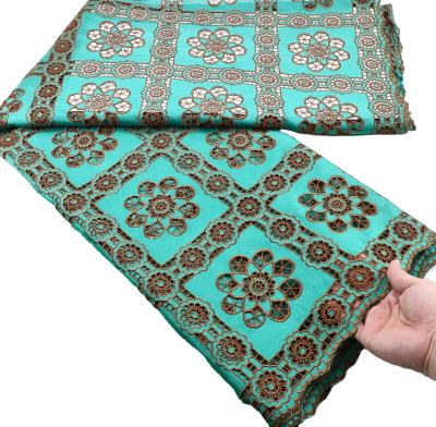 China latest cord lace in embroidered fabric quipure lace fabric with colorful stones elegant women dress for party and show for sale