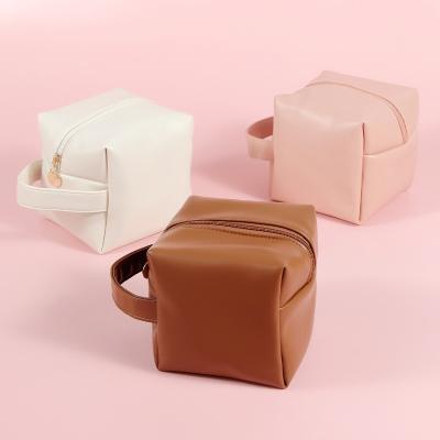 China Fashion Wholesale Small Beauty Zipper Pouch Cosmetic Bags With Handle Custom Make Up Bag Pouch Cosmetic Toiletries Organizer for sale