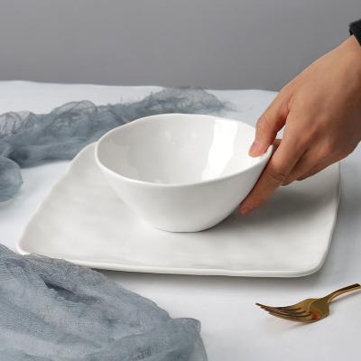 China Customized Sustainable Design Popular Porcelain White Dinnerware Set Hand Made Ceramic Bowl Dinner Plate for sale