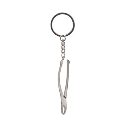 China Dental Metal Hand Pieces Key Chain For Gift Foshan Dental Safety for sale