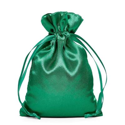 China Elegant Small Emerald Silk Fabric Drawstring Bag Gift For Watch Packaging for sale