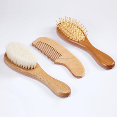 China Professional Salon Eco-Friendly Natural 3 Piece Baby Brush And Comb Set Goat Wood Brushes for sale