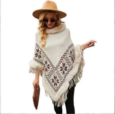 China Winter Breathable Wholesale Ponchos For Adult Women Sweater Fur Ponchos Tassel Sweater Shawl With Pearl for sale