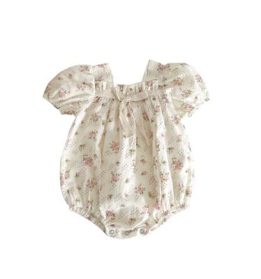 China Cozy Baby Clothes Baby Clothes Summer Puff Sleeves Bows 2023 Organic Baby Clothes Soft Floral Printed Baby 100% Cotton Baby Romper Jumpsuit Rabbit for sale