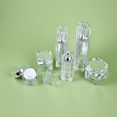 China Personal Care Cylinder Pump Silver Acrylic Bottle Cosmetic Plastic Container For Serum for sale