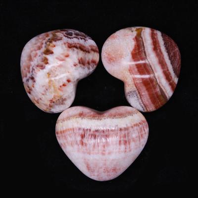 China Crystal Gifts Rough China Natural Colored Gemstone Heart Shape Polished Rhodochrosite for sale