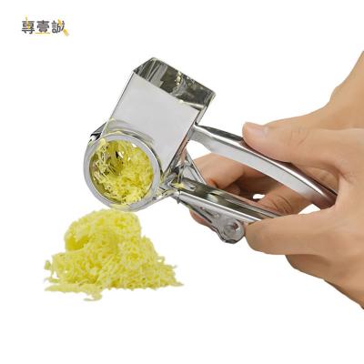 China Food Manual Rotary Drum Kitchen Garlic Grater Cutter Stainless Steel Cheese Vegetable Stored Grater for sale