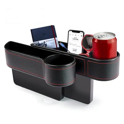 China Sports Waterproof PP Cup Holder Universal Front Side Organizer Side Car Seat Multifunctional Filler Gap For Wallet Cell Phone Coins for sale