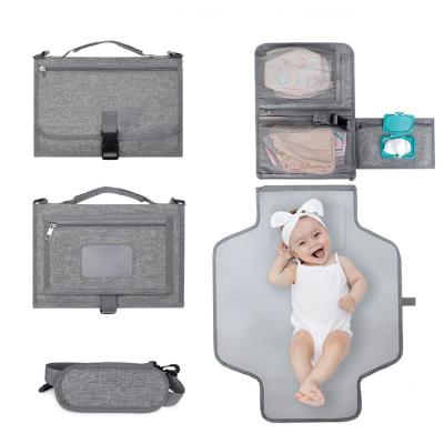 China Portable Outdoor Foldable Diaper Travel Bag Mummy Diaper Changing Pad Baby Changing Mat with Cloth Pocket Design for sale