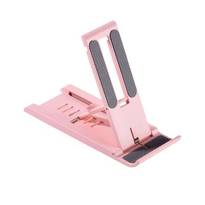 China Multi Angle Adjustable Desk Stand Portable Foldable Mobile Phone Display Tablet Universal Foldable Phone Holder for sale