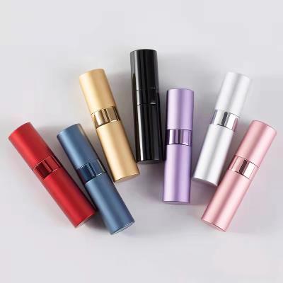 China Round 8ml Cosmetic Colorful Twist Up Perfume Spray Pump Aluminum Pocket Bottle For Travel for sale