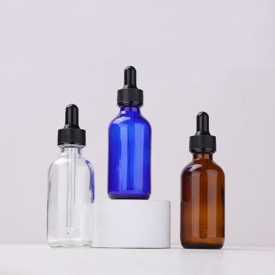 China Hot Sale Personal Care Essential Oil e Round Clear Blue Amber Liquid 30ml 60ml 120ml Hot Sale Boston Glass Dropper Bottles for sale