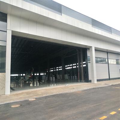 China Fire Protection Aircraft Helicopter Vertical Sliding Lifting Fabric Hangar Doors for sale