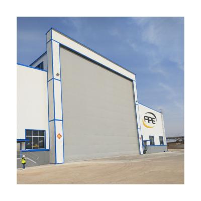 China Waterproof Factory Price Sealed Flexible Automatic Large-span Steel Aircraft Hangar Door for sale