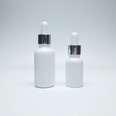 China 15ML 30ml 50ml 100ml Porcelain Cosmetic White Dropper Bottles For Essential Oil Bottles for sale