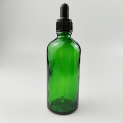 China 30ml 50ml 100ml Green Glass Cosmetic Refillable Empty Essential Oil Bottles With Glass Dropper for sale