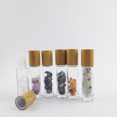 China 10ml Cosmetic Essential Oil Gemstone Refillable Glass Roller Bottles With Bamboo Lids for sale