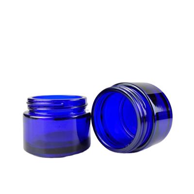 China 30g 50g 60g 100g Cosmetic Blue Round Shape Glass Cosmetics Jar Glass Jar For Candle for sale