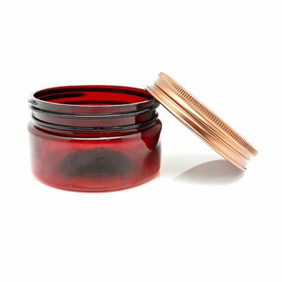 China 100g Cosmetic Round Cosmetic Bronze Amber Brown Skin Care PET Plastic Cream Jar With Aluminum Lids for sale