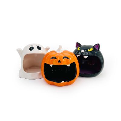 China Black Cat Ceramic Party Decoration Ghost Candlestick Halloween Pumpkin Candlestick for sale