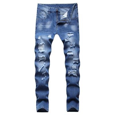 China Breathable manufacturers sell young blue jeans men with holes in the middle European and American jeans waist pants for sale