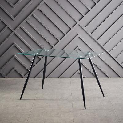 China Modern Hot Selling Modern Simple Square Metal Leg Tempered Glass Black Dining Table for sale