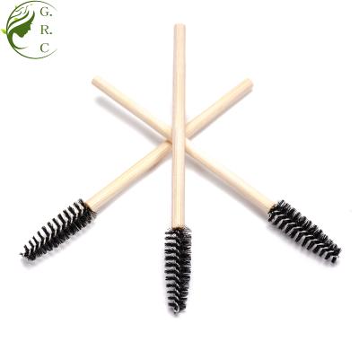 中国 Wooden Handle Tapered Eco-friendly Disposable Natural Bamboo Eyelash Sweep Nylon Fiber Mascara Wand Brush 販売のため